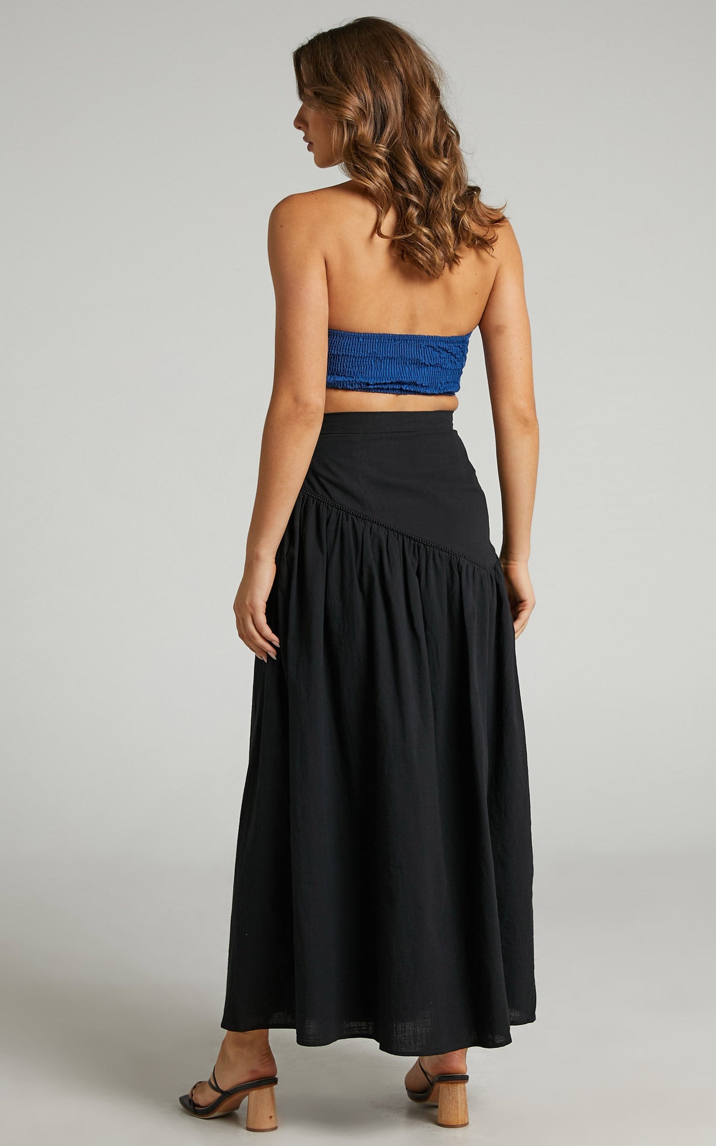 Jalena Thigh Slit Asymmetric Maxi Skirt in Black