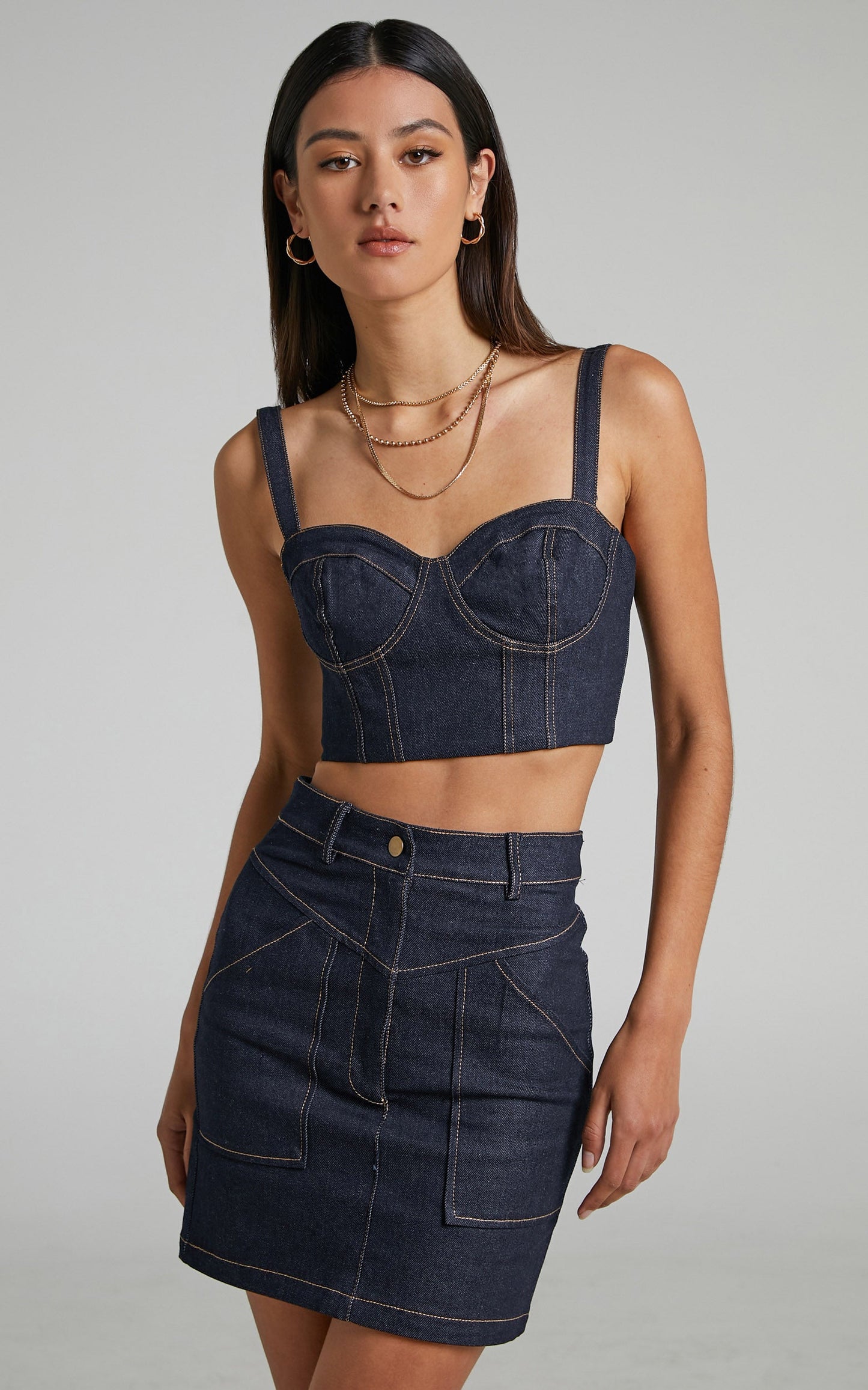 Jayeleh Denim Topstitched Mini Skirt in Indigo Wash