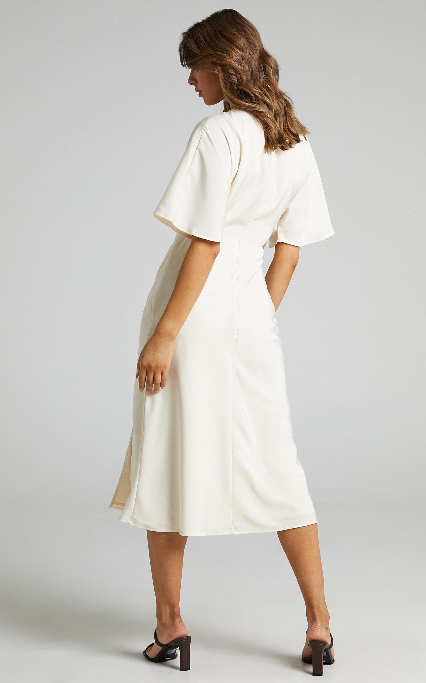 Joja Flutter Sleeve Cut Out Midi Dress in Cream
