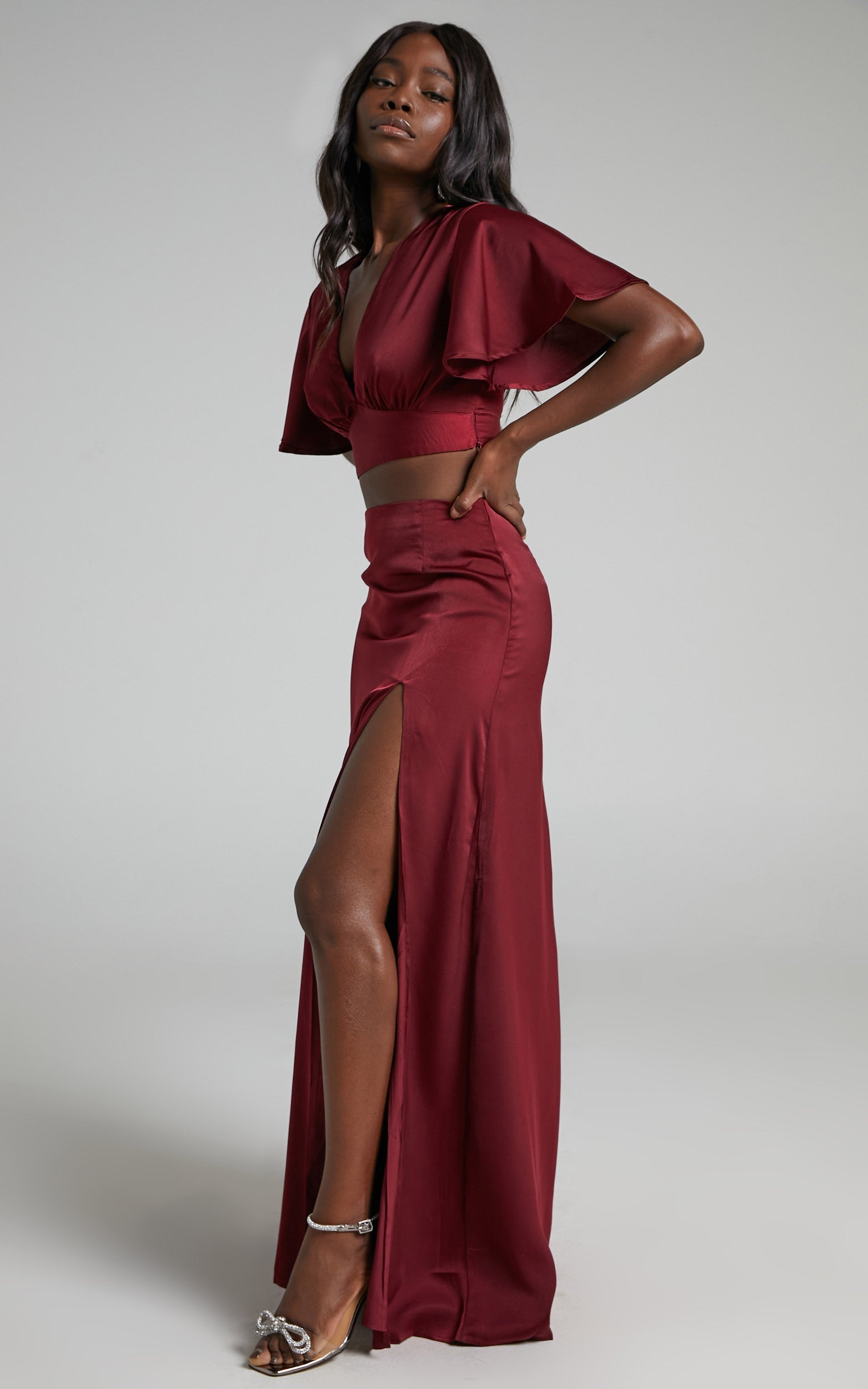 Kelcie Two Piece Set - V Neck Flutter Sleeves Crop Top and Thigh Split Maxi Skirt Set in Wine