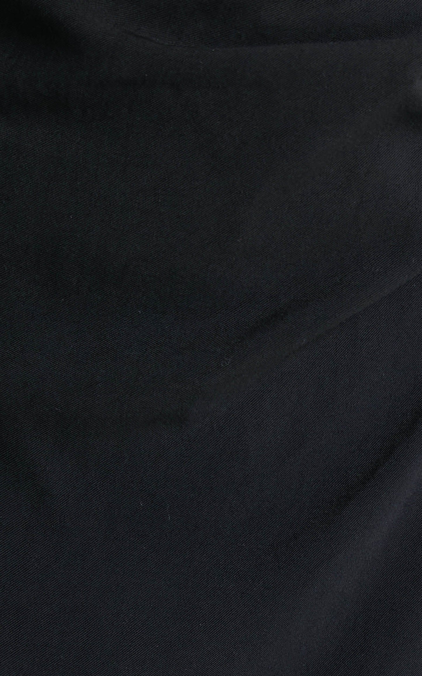 Larra Asymmetrical Pleated Skirt in Black