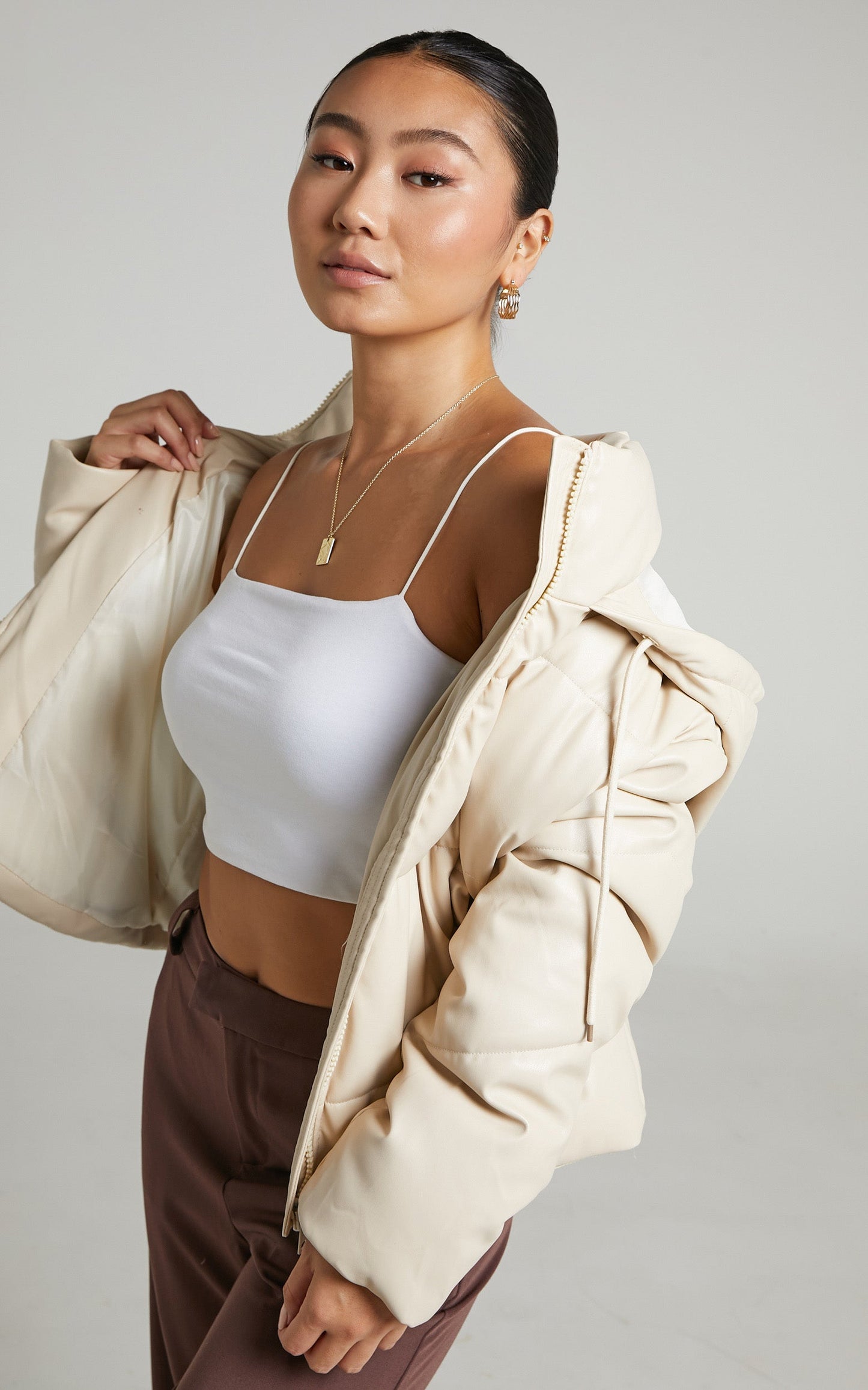 Lizzee Hooded Faux Leather Puffer Jacket in Beige