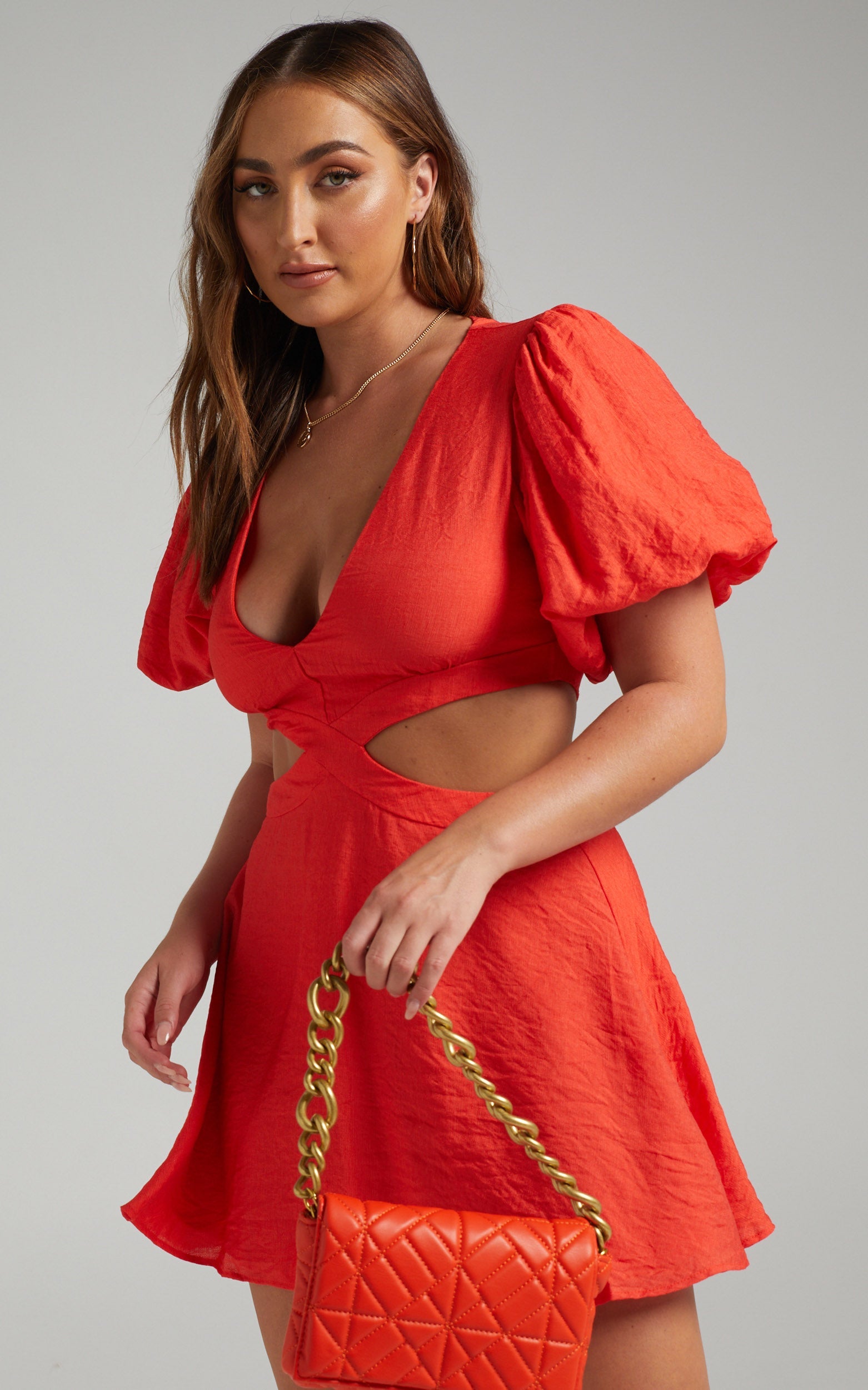 Jacqueline Side Cut Out Puff Sleeve Mini Dress in Red