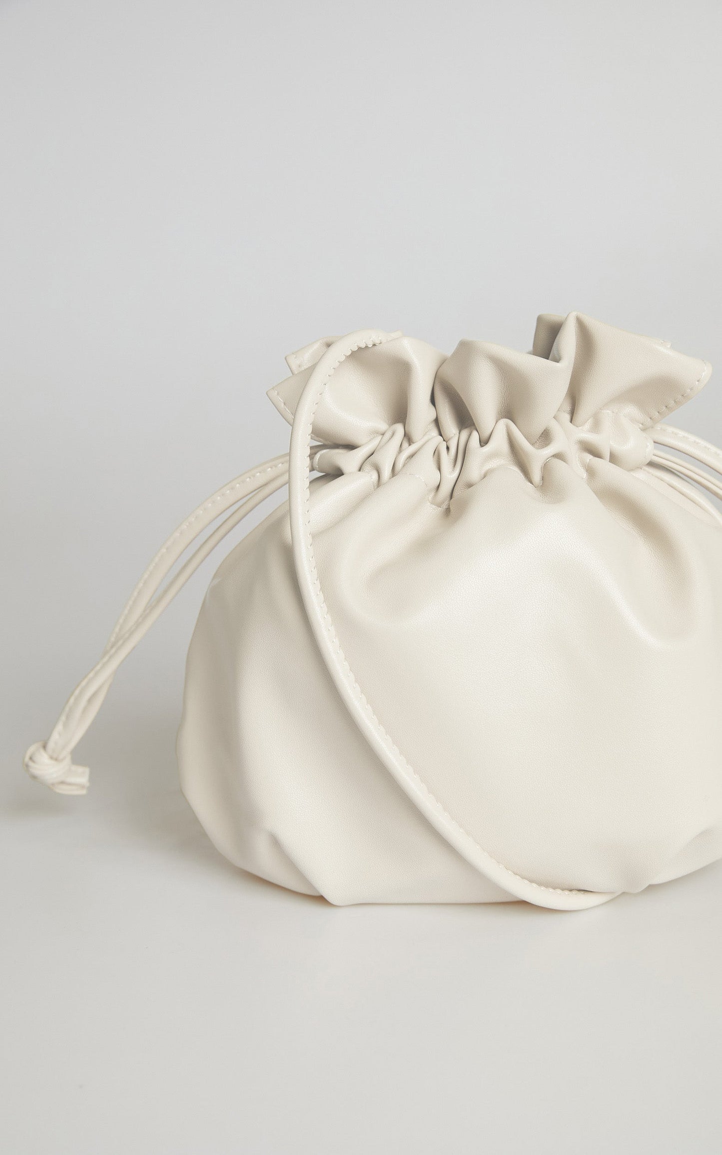 Margarid Drawstring Bag in Beige