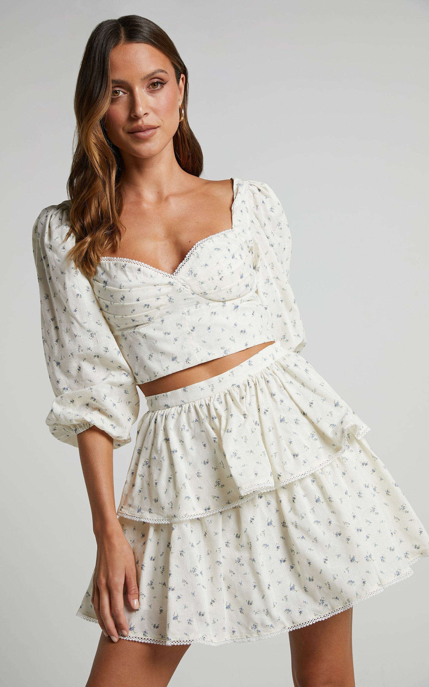 Normae Two Piece Set - Long Sleeve Bustier Top & Mini Skirt Set in White/blue floral