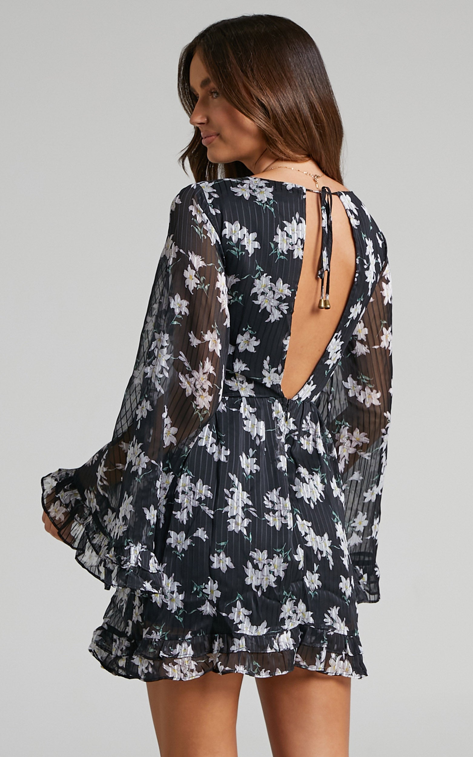 Paislee Open Back Long Sleeve Mini Dress in Black Floral