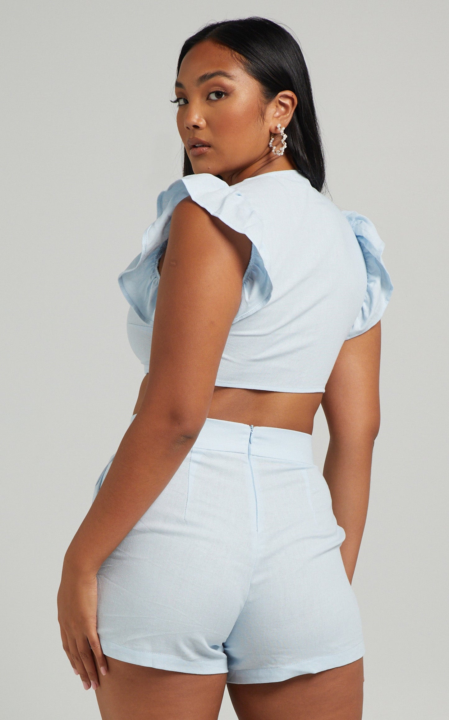 Arcaja Two Piece Short Set with Frill Sleeve Crop Top In Linen in Light Blue Linen Look