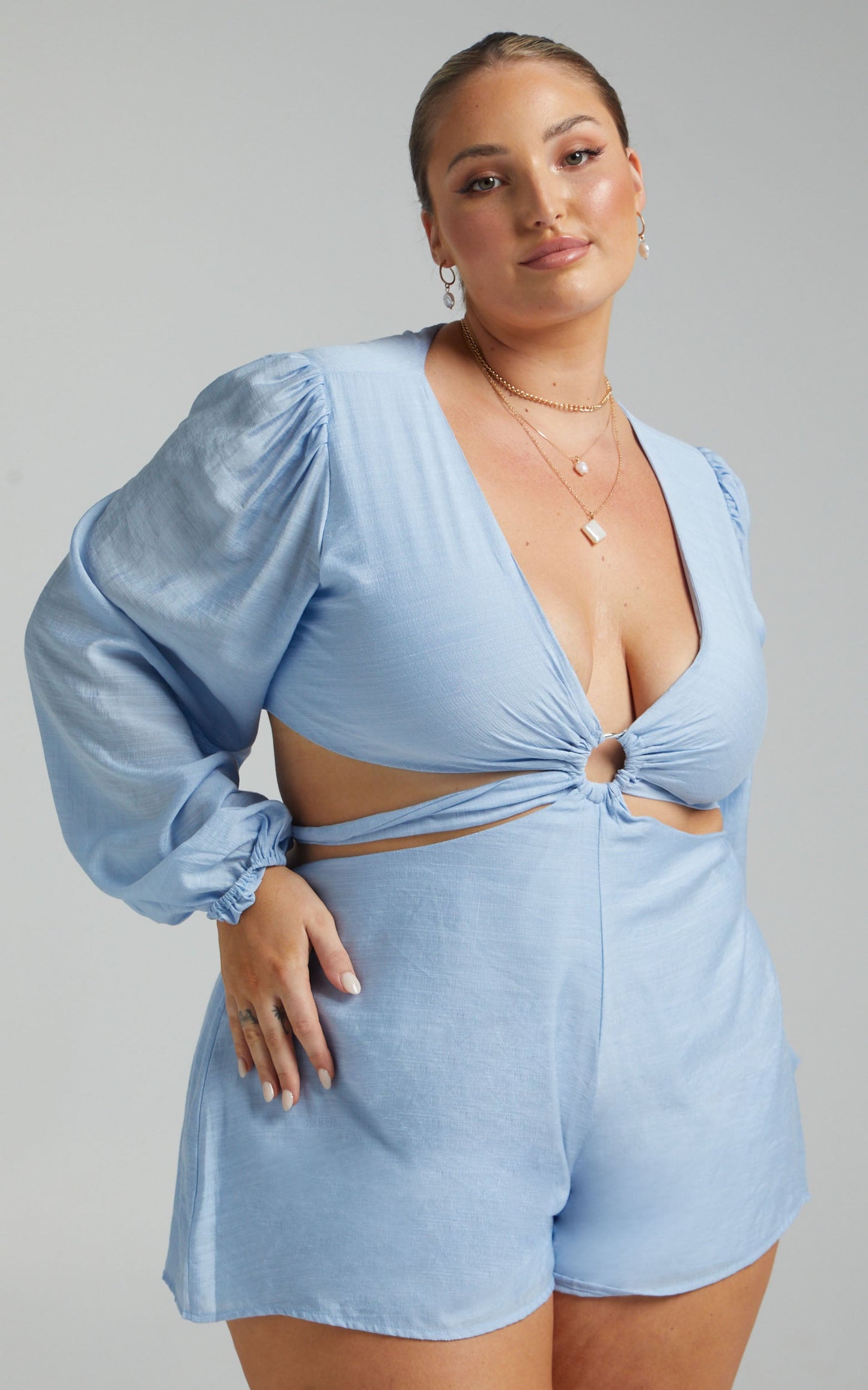 Primrose Cut Out Tie Back Long Sleeve Playsuit in Blue