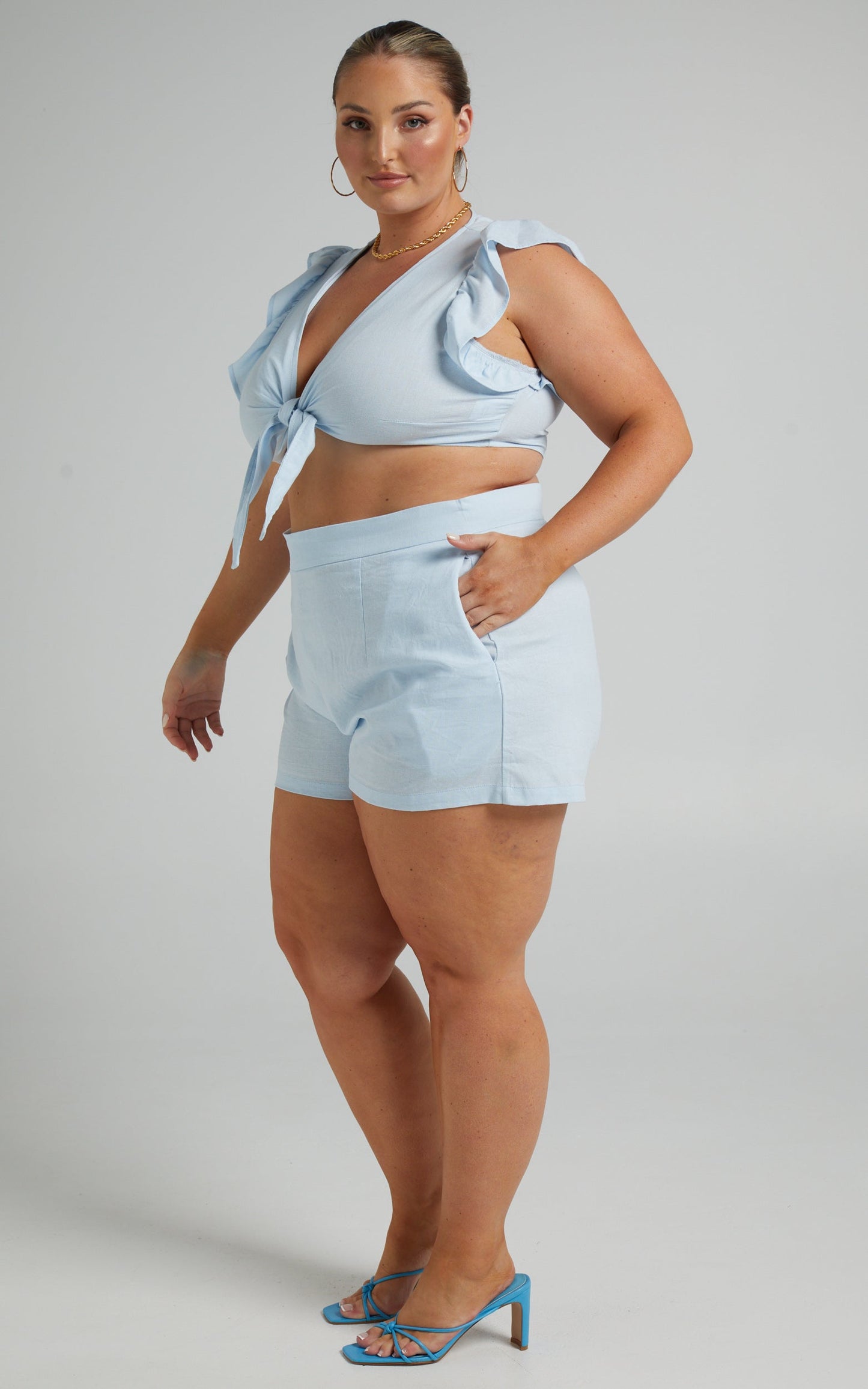 Arcaja Two Piece Short Set with Frill Sleeve Crop Top In Linen in Light Blue Linen Look