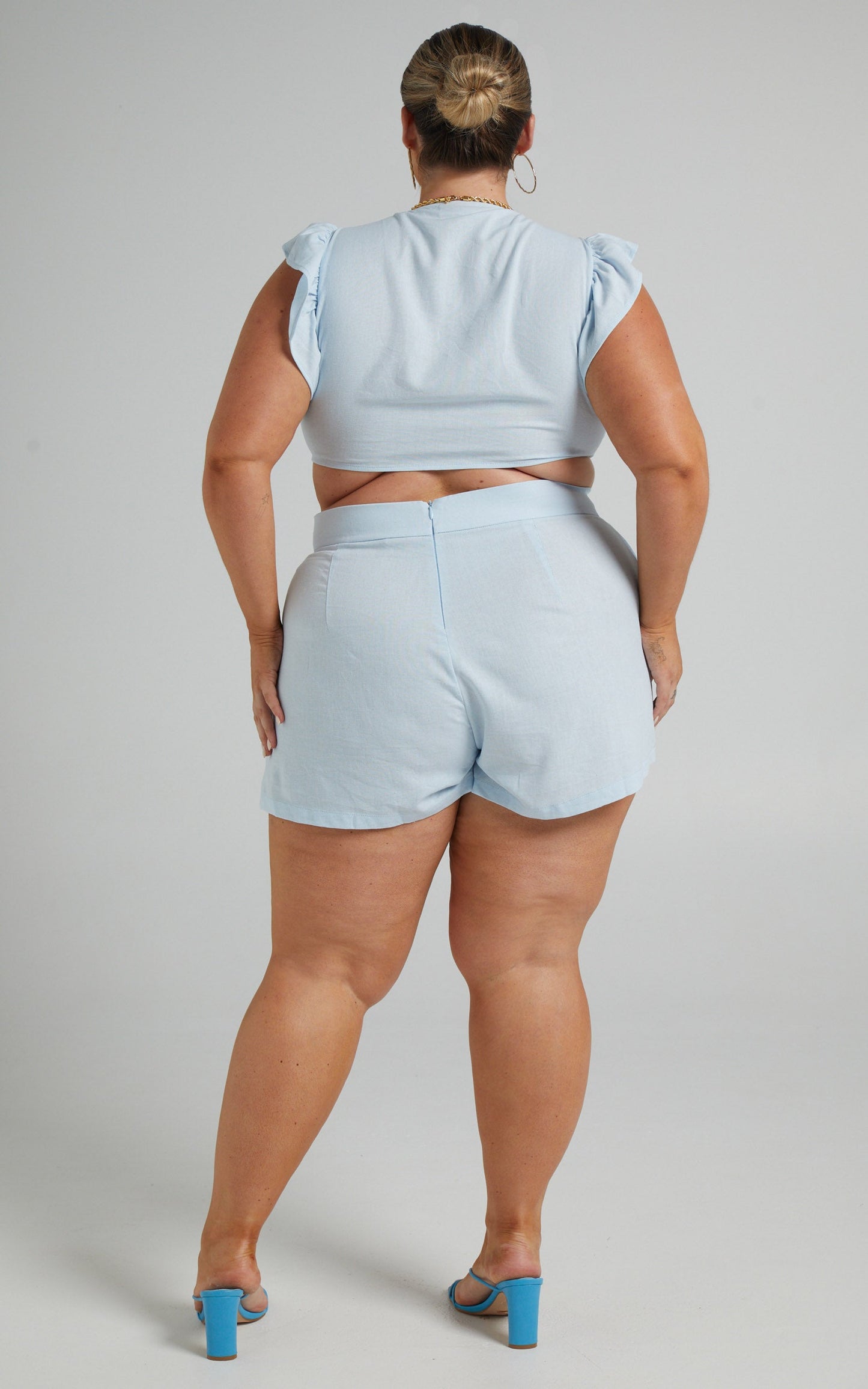 Arcaja Two Piece Short Set with Frill Sleeve Crop Top In Linen in Light Blue Linen Look