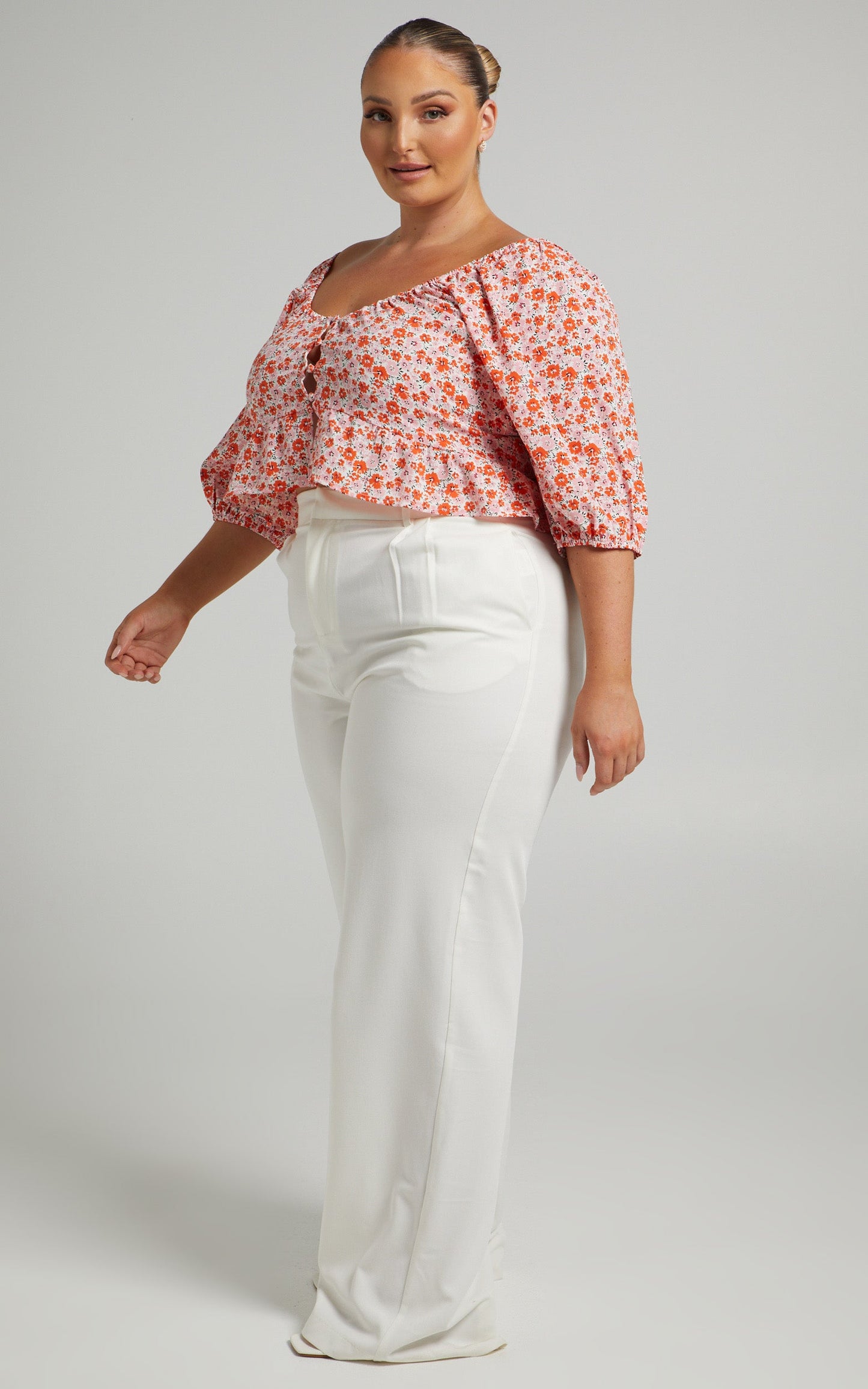 Daisee Button Up Short sleeve peplum Blouse in Pink Floral