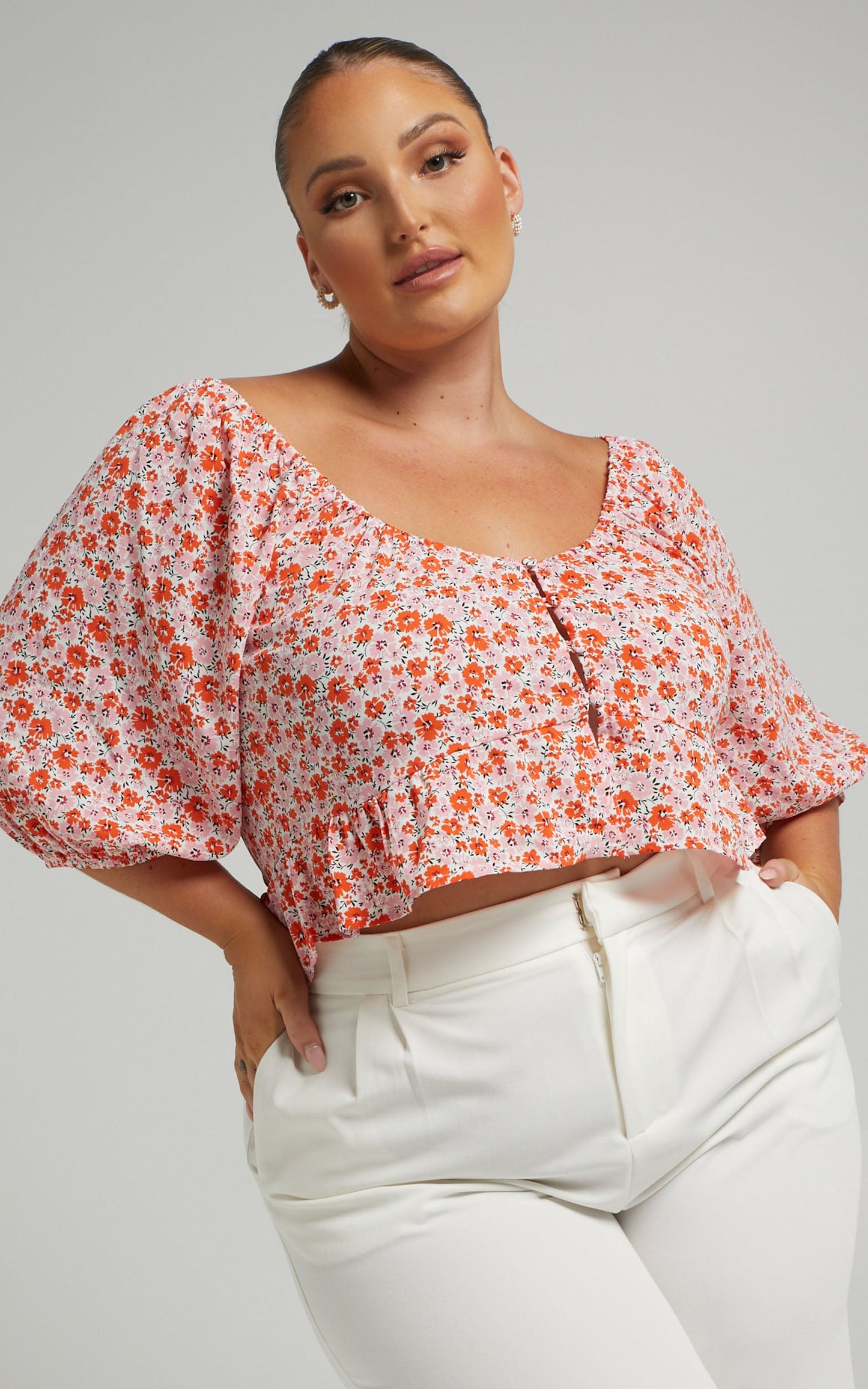 Daisee Button Up Short sleeve peplum Blouse in Pink Floral
