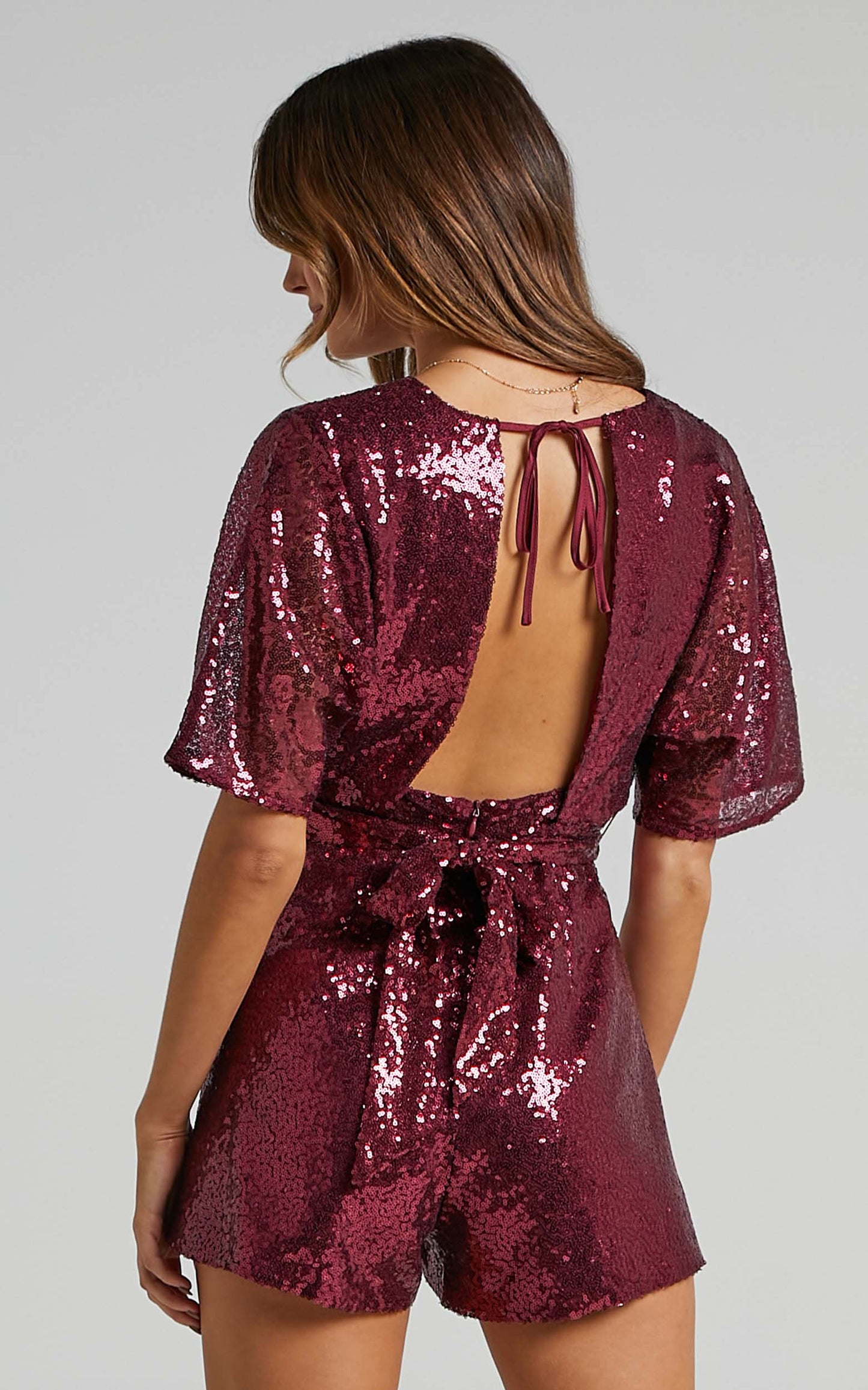 Star Behaviour Playsuit In Wine Sequin