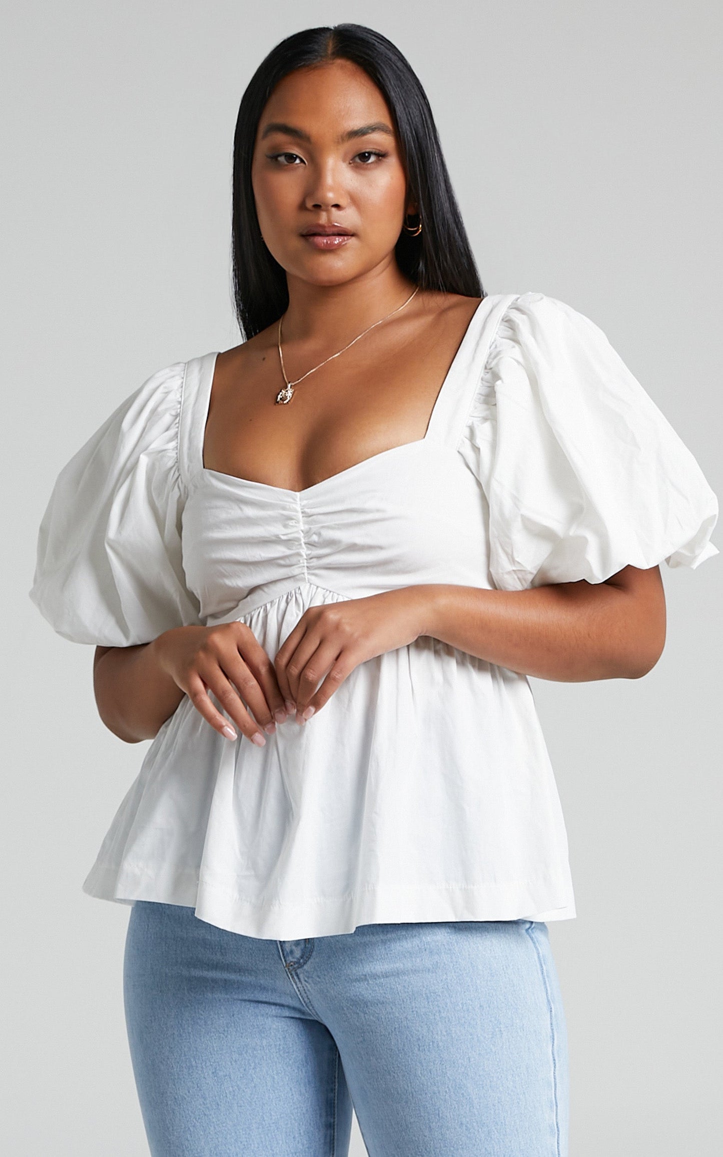 Shanskie Puff Sleeve Peplum Top in Off White
