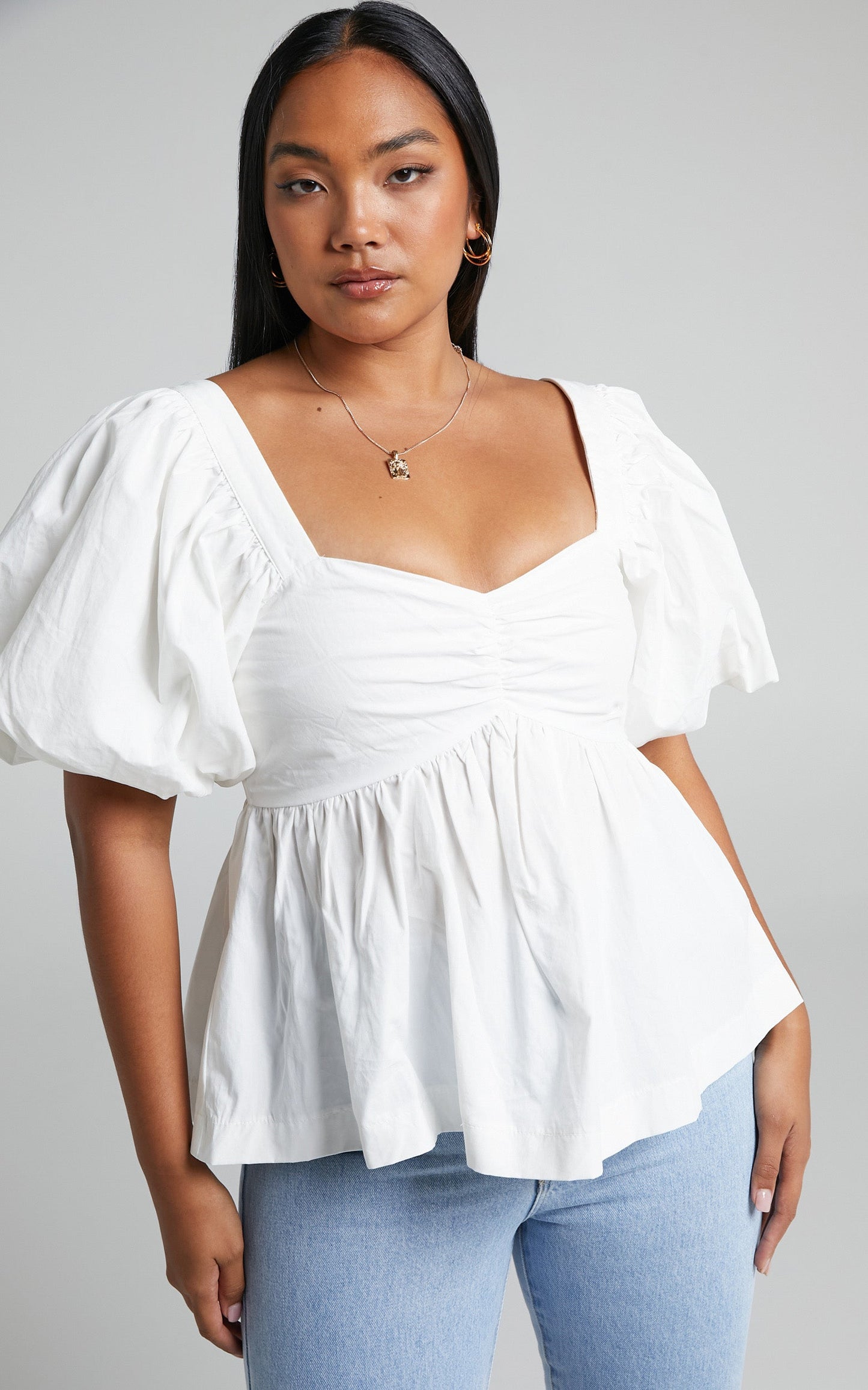 Shanskie Puff Sleeve Peplum Top in Off White