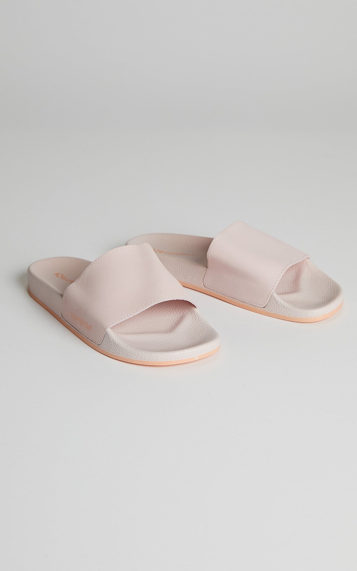 Superga - 1908 Buttersoft Slides in Pink & Apricot