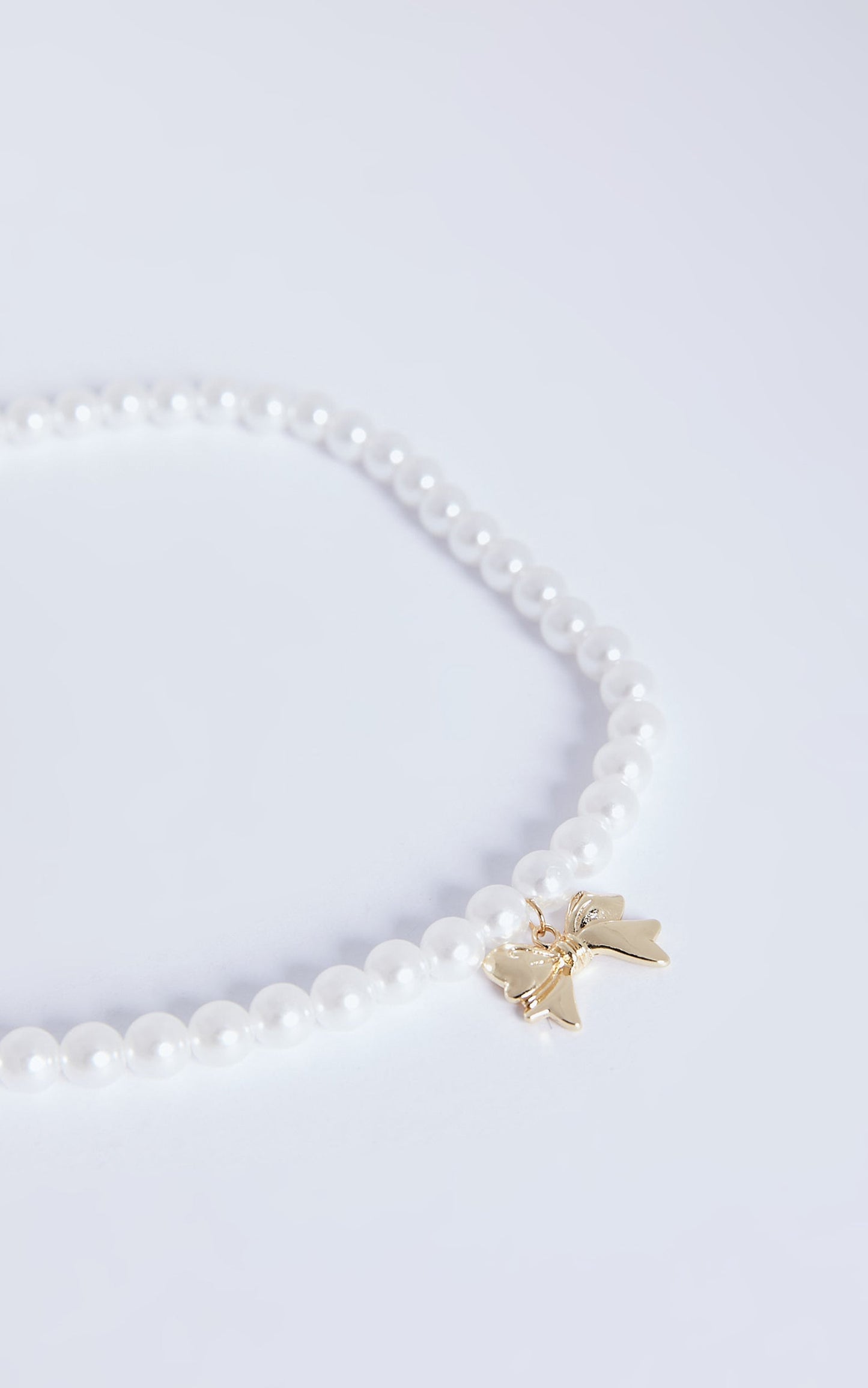 Wallace Necklace - Bow Shaped Pearl Necklace in Gold