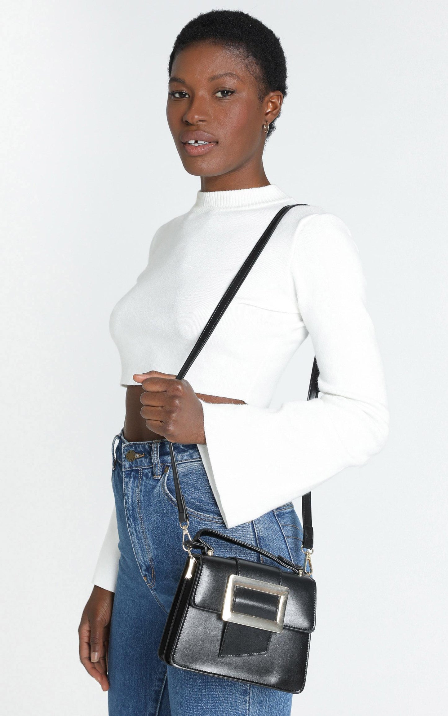 In Time Buckle Sling Bag in Black and Gold
