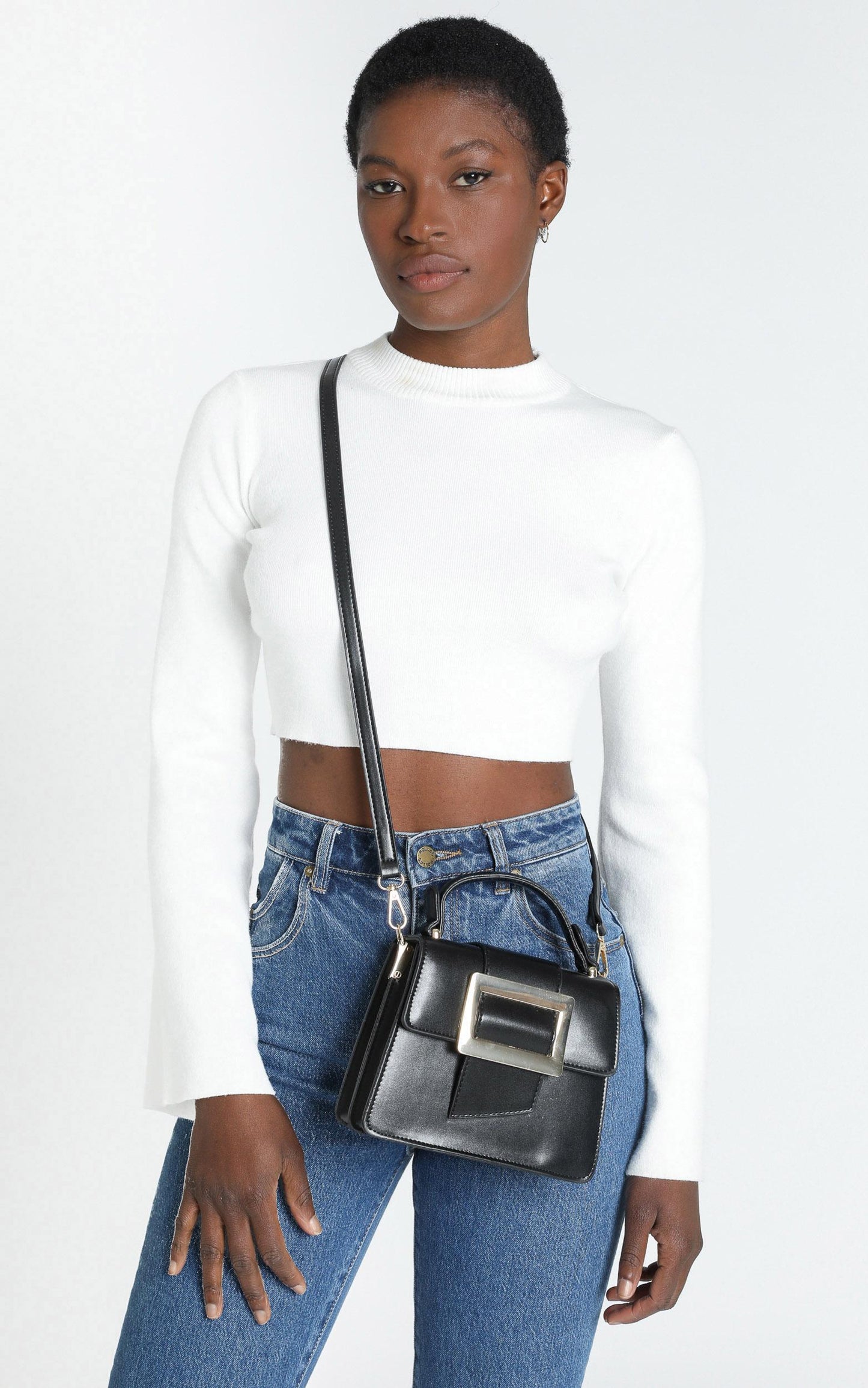 In Time Buckle Sling Bag in Black and Gold