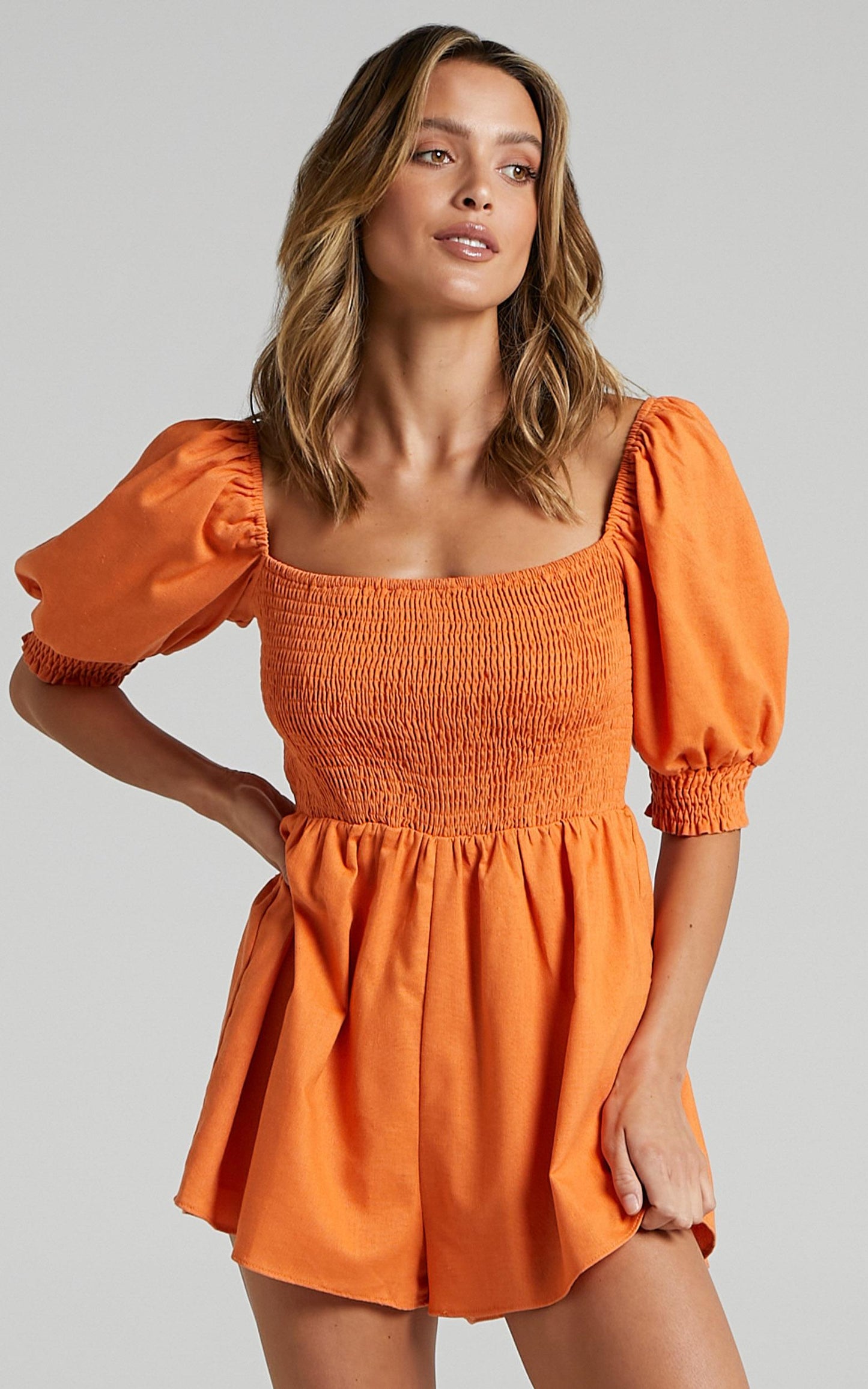 Take Action Playsuit - Linen Look Puff Sleeve Shirred Playsuit in Orange