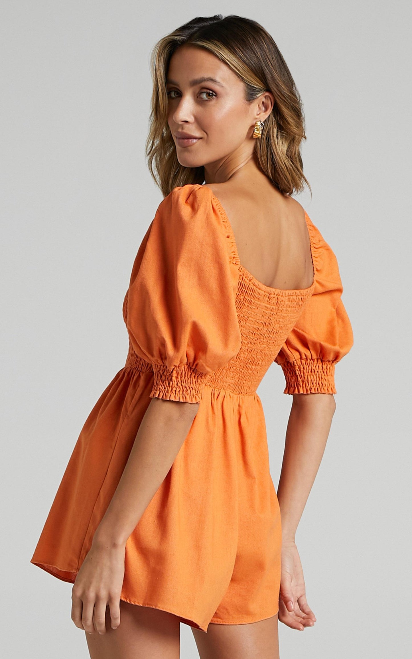 Take Action Playsuit - Linen Look Puff Sleeve Shirred Playsuit in Orange