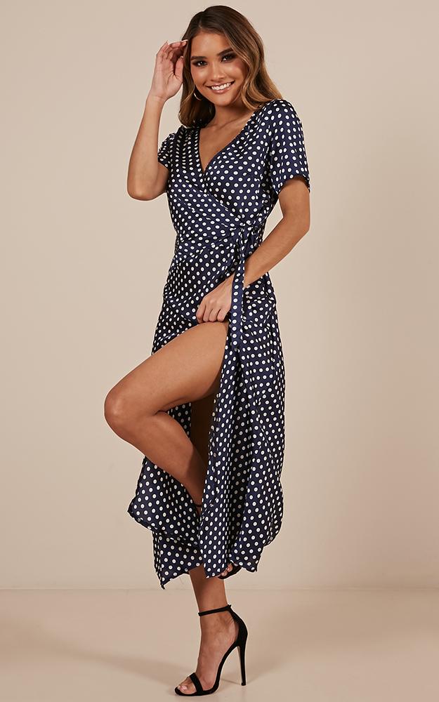 Laying Low Wrap Dress In Navy Polka Dot Satin