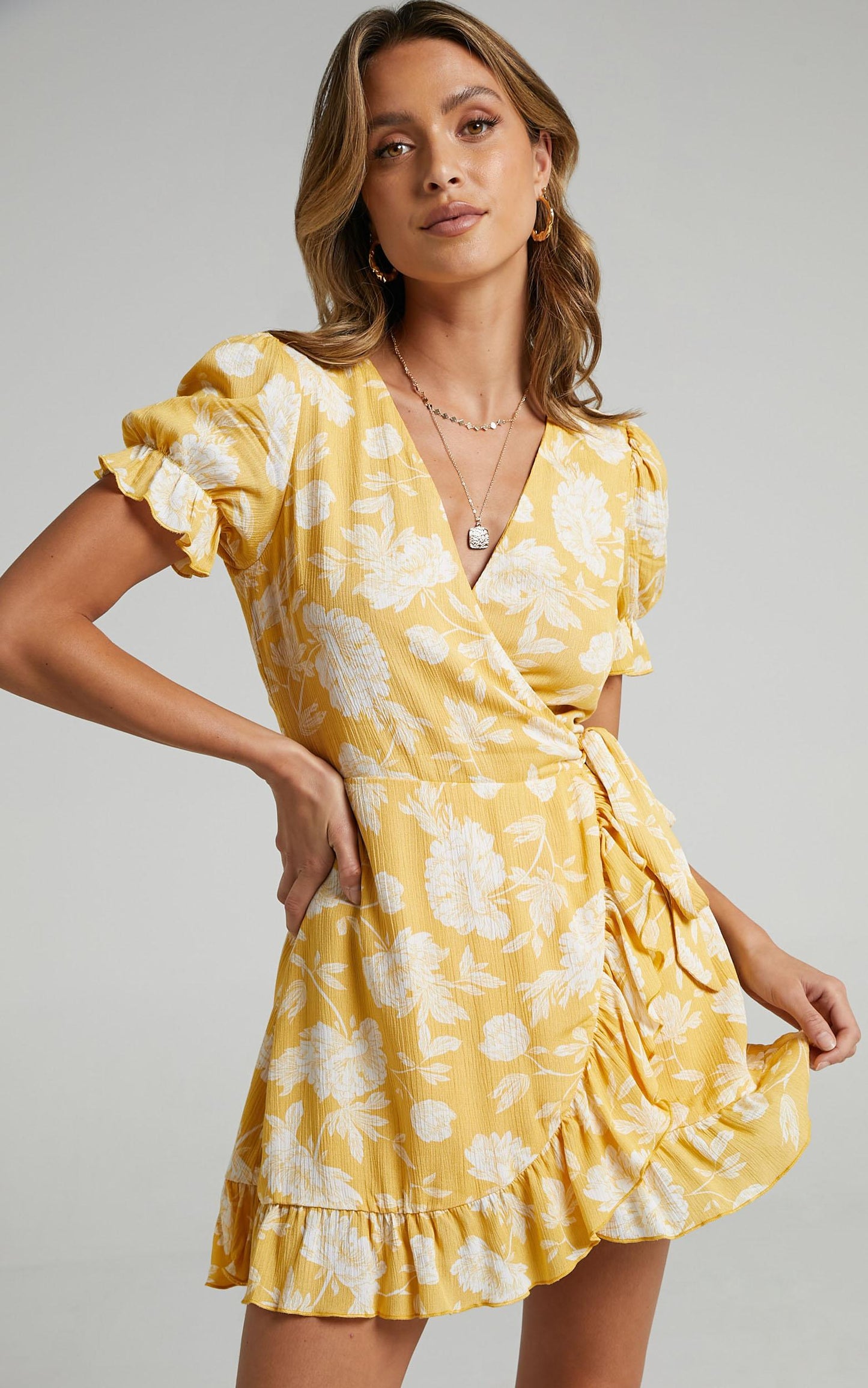 Seaside Views wrap mini Dress in Yellow Floral