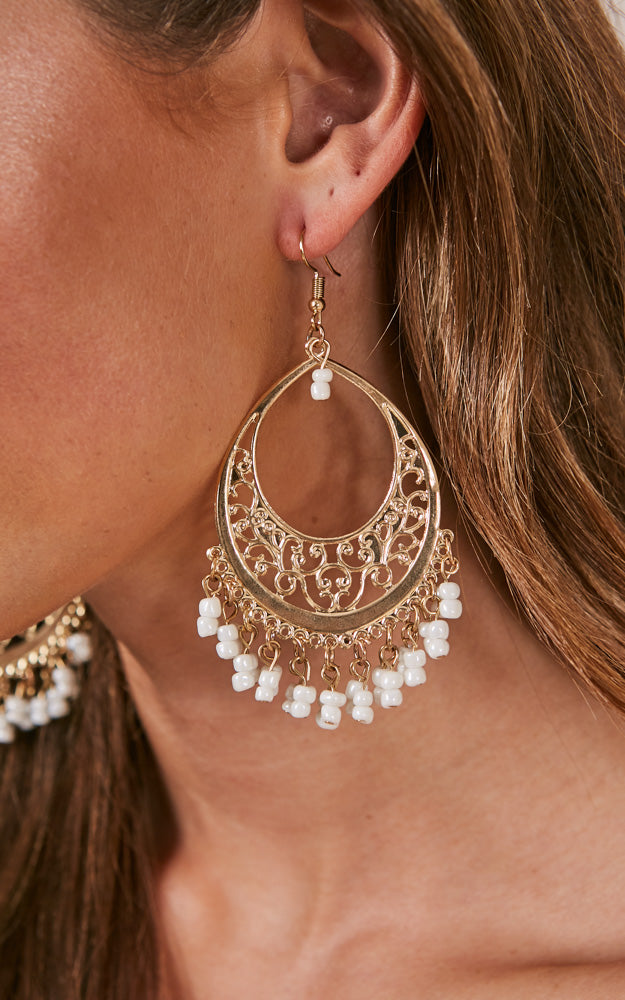 Unheard Of earrings in gold